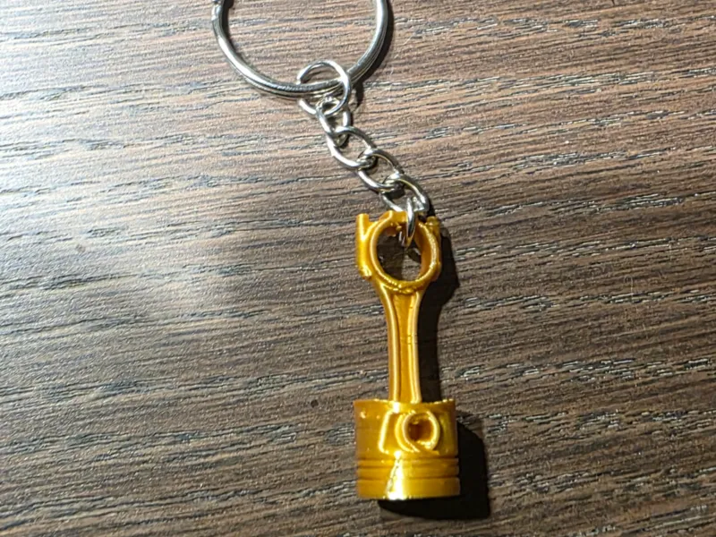Piston keyring