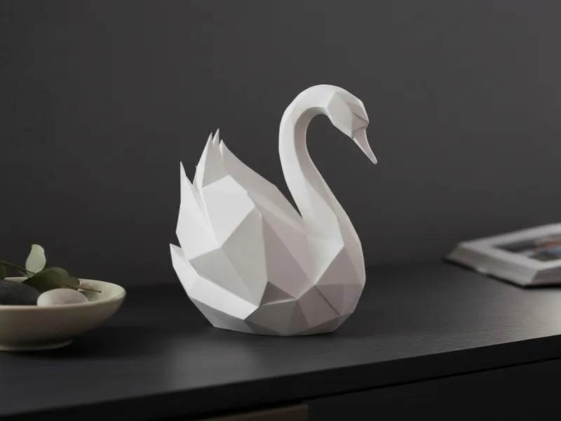 Sculpture de cygne gracieuse en low poly