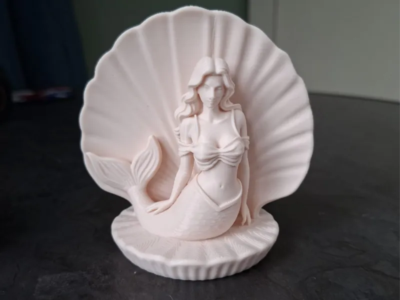 Elegant Mermaid in Seashell Statue