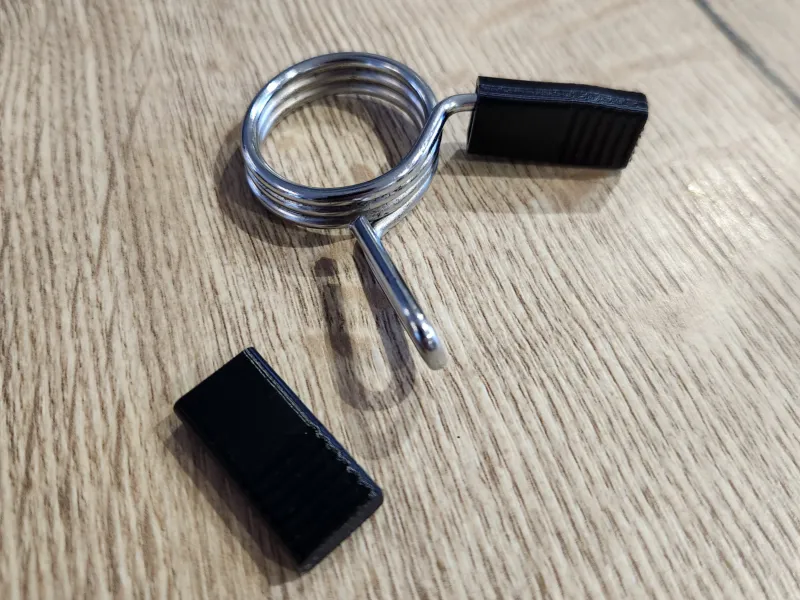 Bouchon pince à ressort