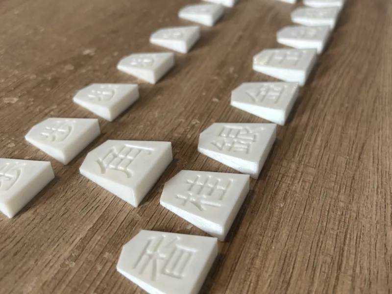 Pièces de Shogi (chacune standardisée)