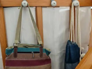 Railing holder for bags