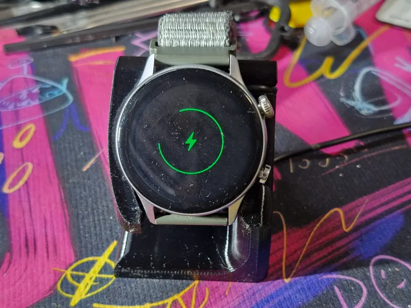 Magnetic charging watch holder