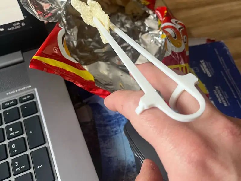 A device for eating chips, nachos, chopsticks for eating