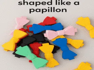 Papillon-shaped design clip for closing food bags
