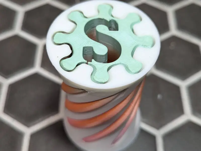 Fidget Espiral con Letra S Interna Giro de 180 Grados Pasante
