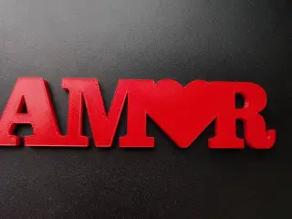 "AMOR 3D Lettering with Integrated Heart Design"