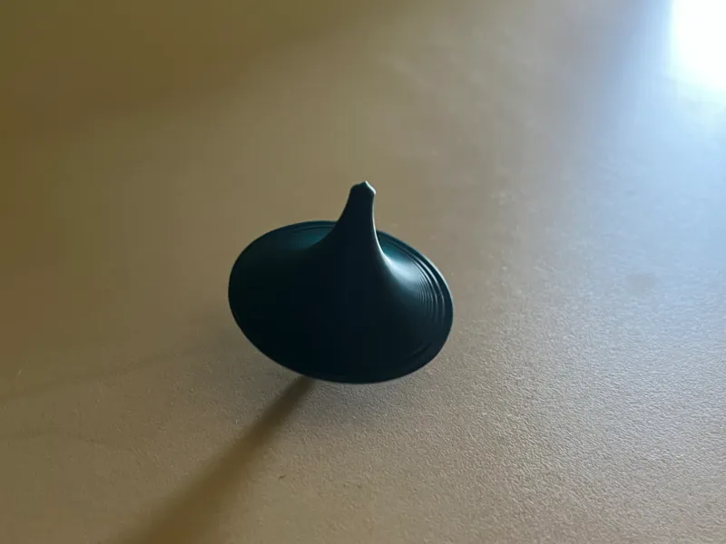 classic red plastic spinning top