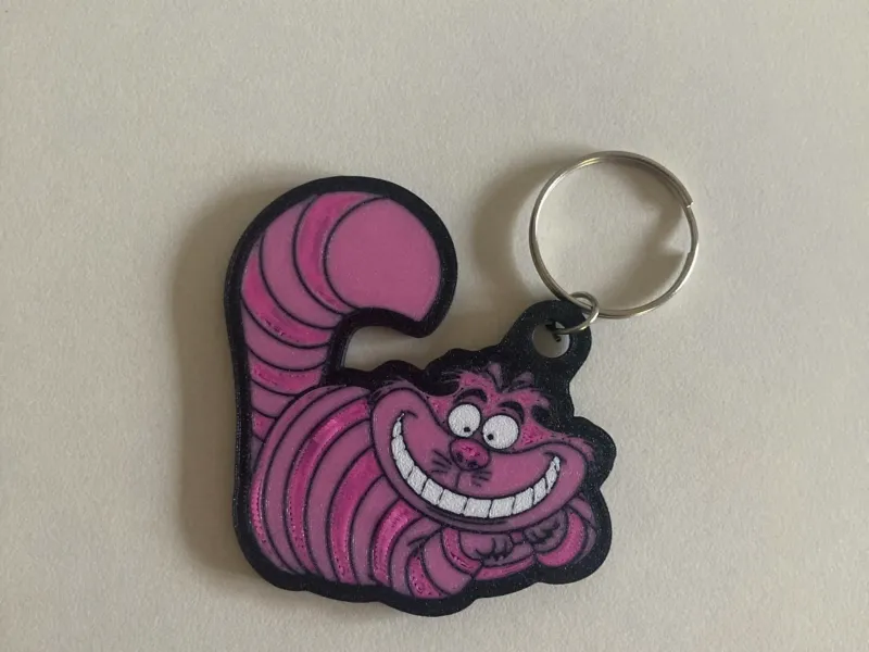 Porte-clés Chat du Cheshire d'Alice au pays des merveilles