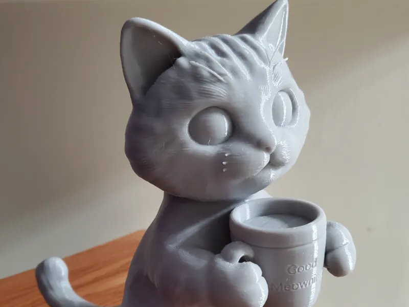 Кошка с кружкой