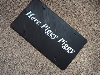 motorcycle vanity plate "here piggy piggy"