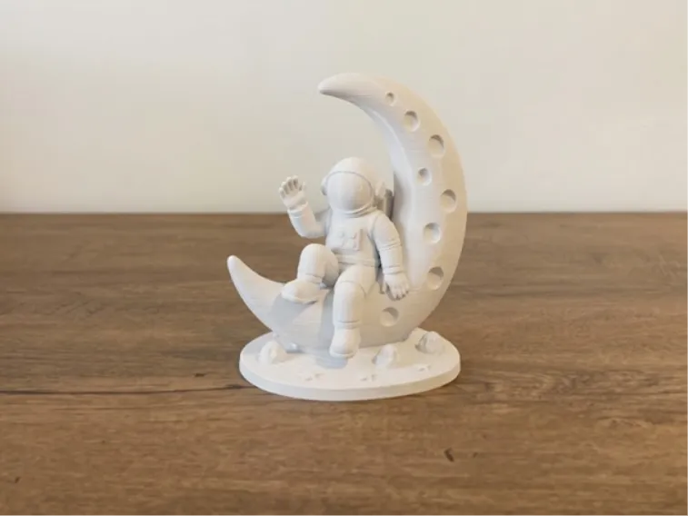 Astronaut Sitting on the Moon - Space Decoration