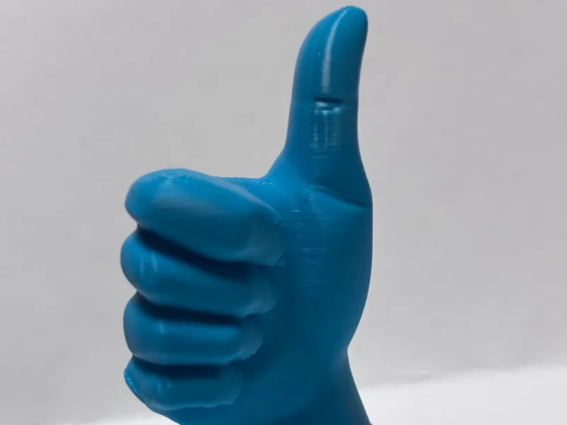 Thumbs up sculpture
