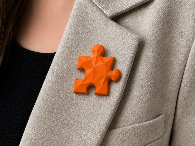 Distintivo / spilla puzzle a bassa poligonazione