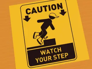 Caution watch your step sign