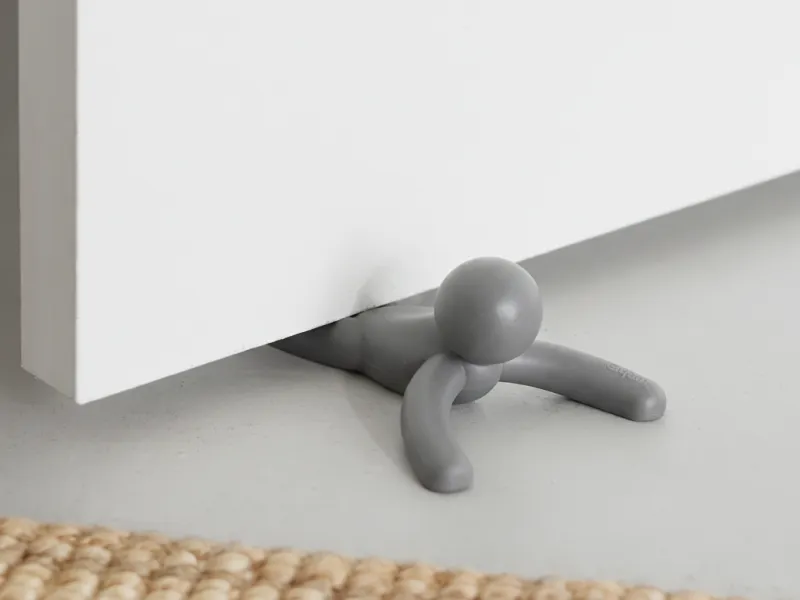 Crushed guy door holder