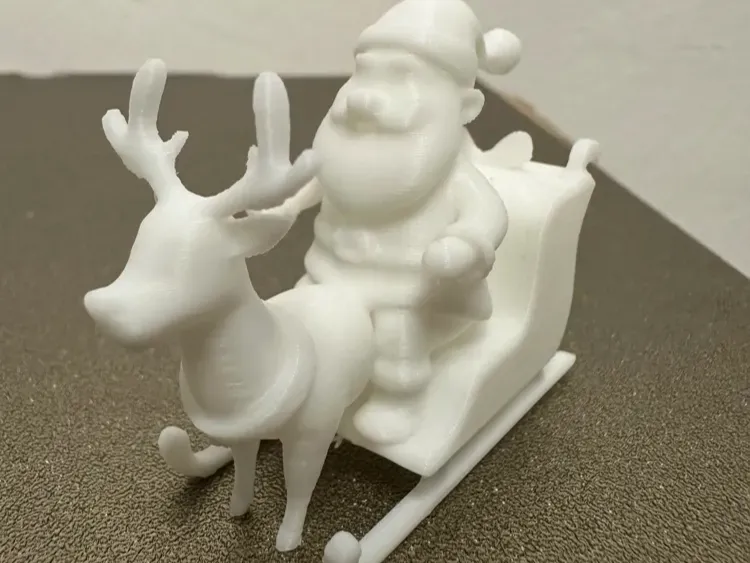 Kerstman op slee met rendier