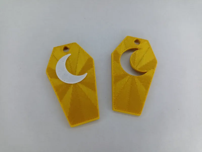 LUNA - ORECCHINO O PORTACHIAVI A FORMA DI BARA