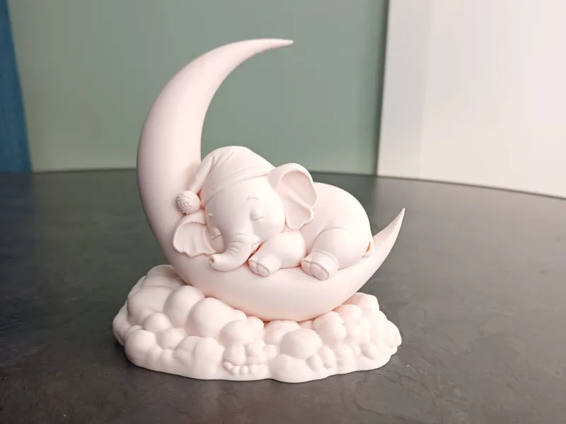 Sleeping Baby Elephant on Crescent Moon