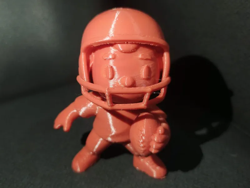 Chibi American Football Player With Helmet And Ball Figurine