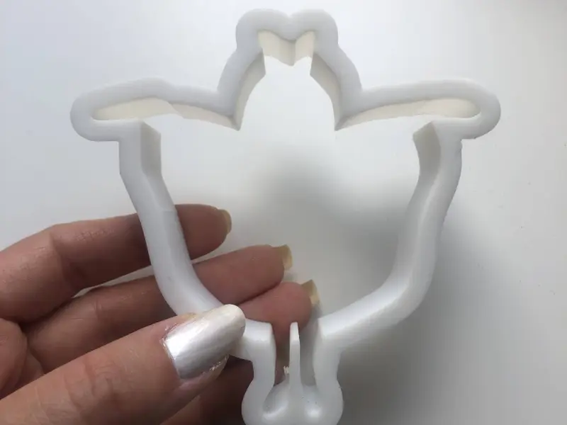 Girl dressed as butterfly cookie cutter