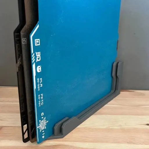 Low cost build plate holder storage system
