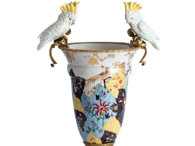 Two Cockatoos on an Ornate Porcelain Vase