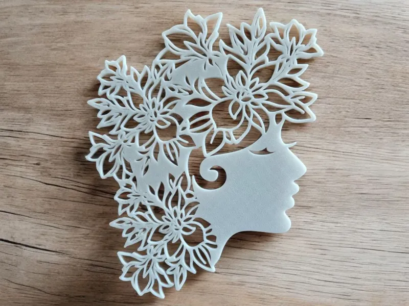 Head of a girl with flowered hair