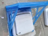Power outlet protector and shelf 2in1-0