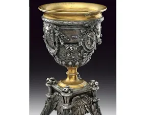 Ornate gilded goblet on a rococo stand