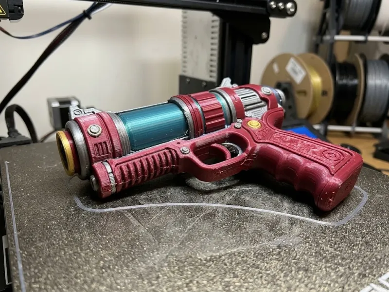 Arsenal : Le Pistolet Laser Écarlate