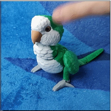 Figurine articulée de perruche quaker