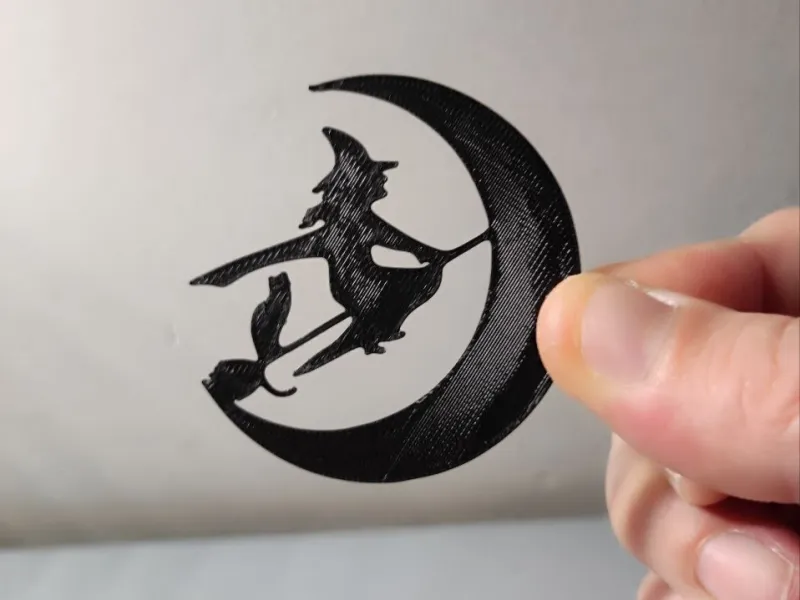 silueta bruja gato luna