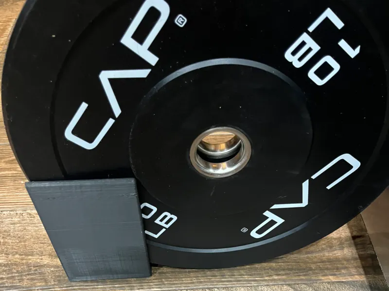 Barbell plate holder