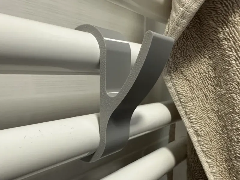 Bathroom radiator towel hanger