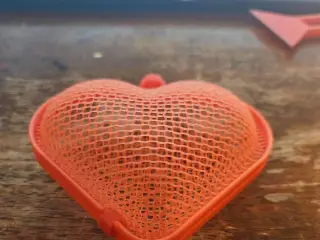 Thermoformed flexible hearts with mold