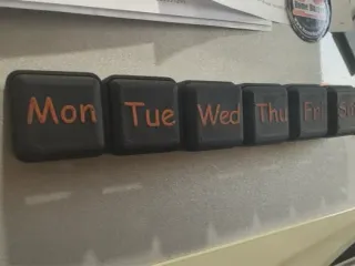 Magnetic pill dispenser
