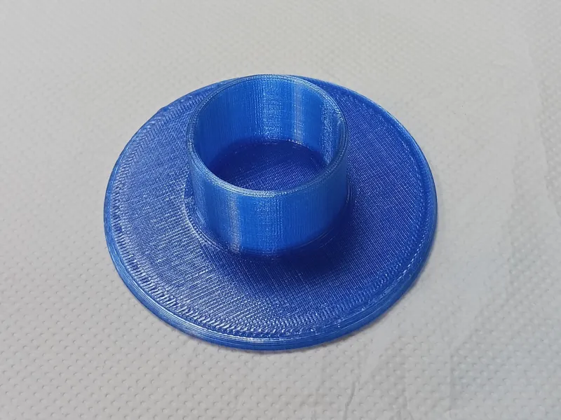 Round stand for a container with a flux.