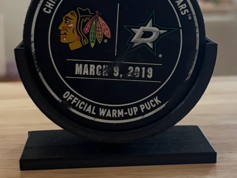 Hockey puck display stand
