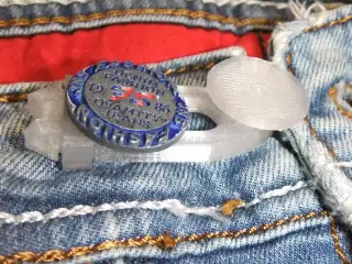 Button extension for clothes