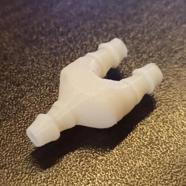 Car window washer splitter.