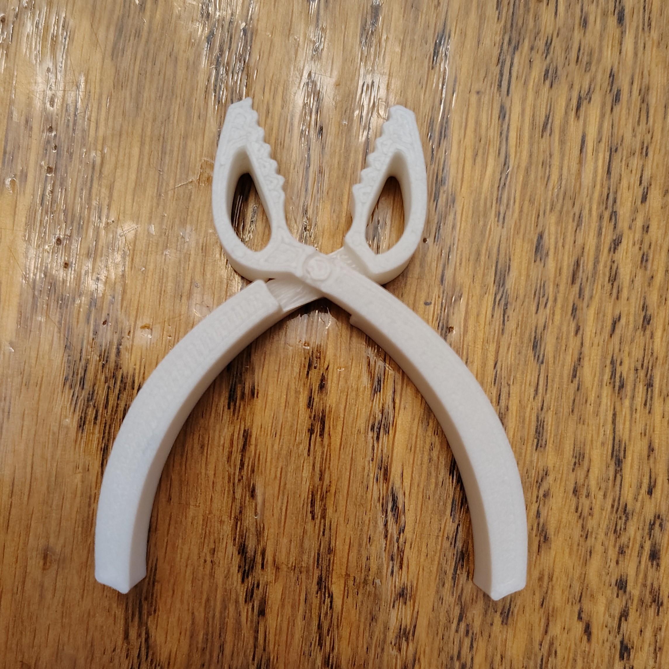 Small print in place pliers 