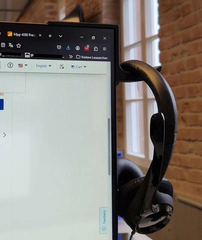 Monitor headphone hanger