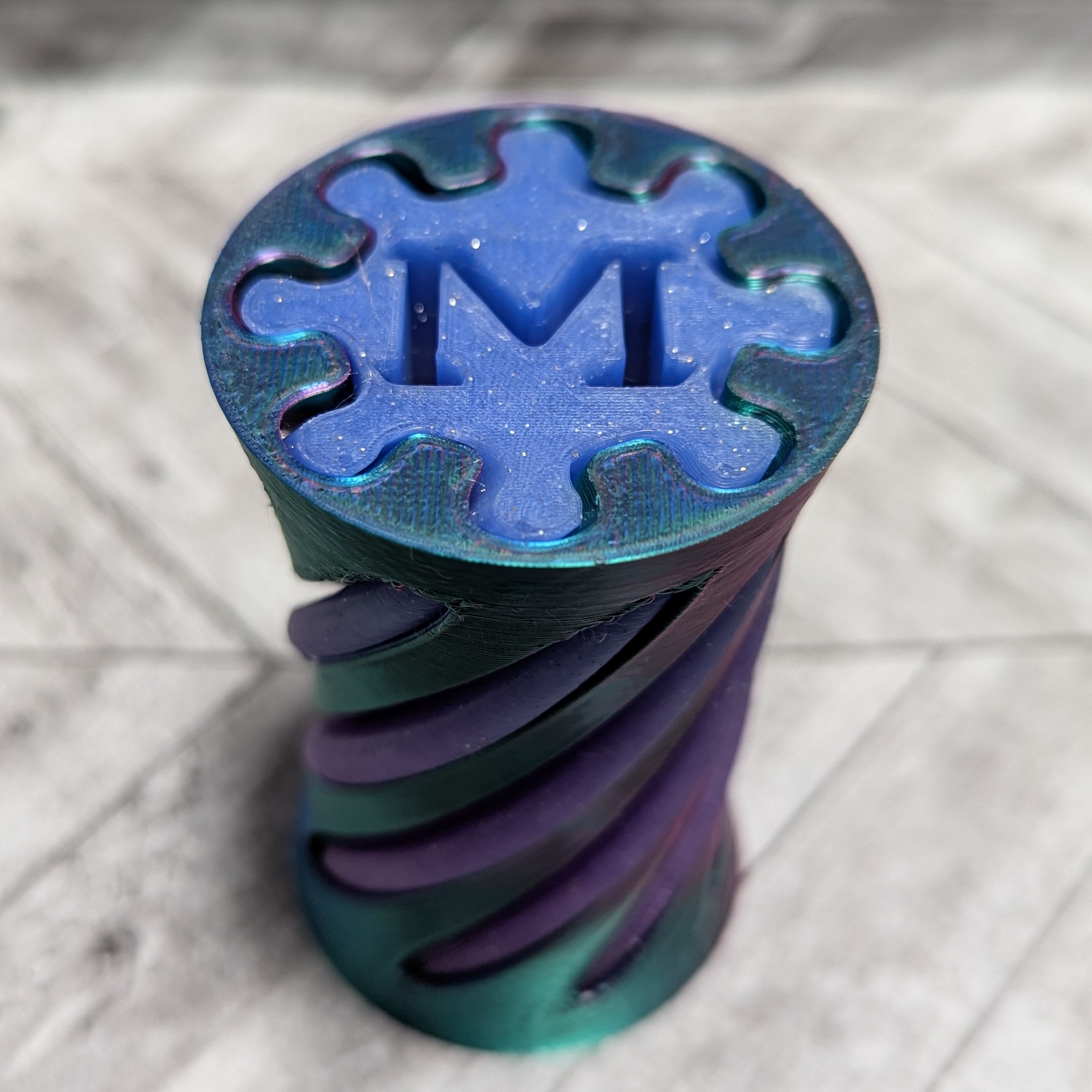 Spiral Fidget Letter M 180 Deg Twist Passthrough