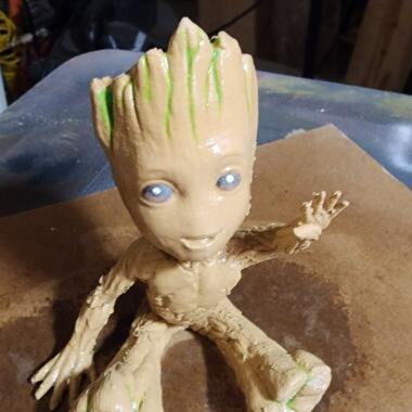 I just tried out some wood filament. The texture is perfect for Groot. I  also tried some called burnt titanium, which is much stronger than standard  PLA. anyway, I like how they