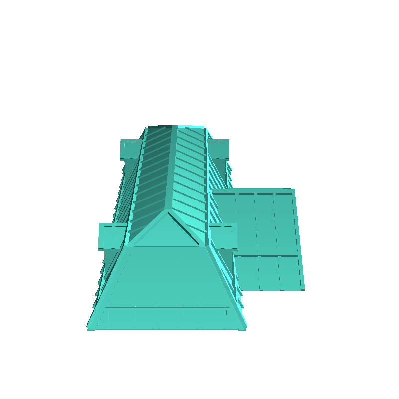 Large building with a zinc roof hewn stone base and flat-roo
