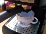 Cup support on the Delonghi coffee maker-0
