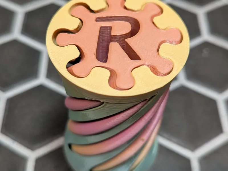 Spiral Internal Letter R Fidget 180 Deg Twist Passthrough