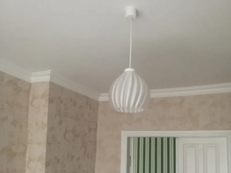 The lampshade on the chandelier