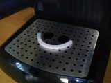 Cup support on the Delonghi coffee maker-1